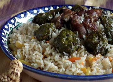 Pilaff with stuffed grape leaves